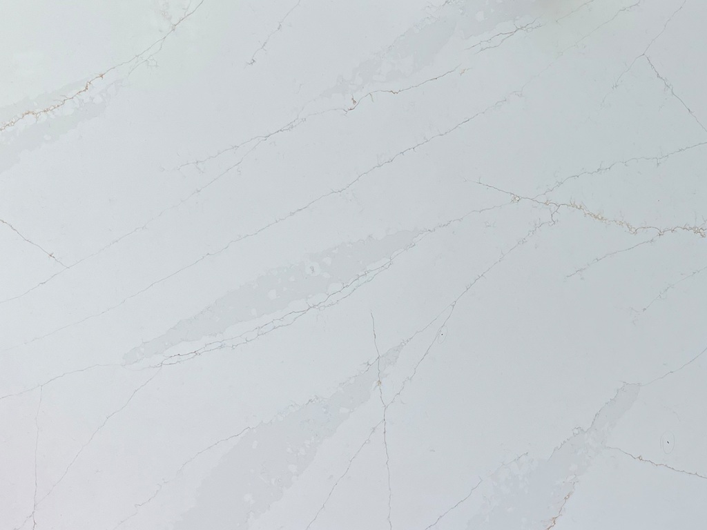 Calacatta Blue Classic Quartz video thumbnail — bright white base with bold blue/grey veining