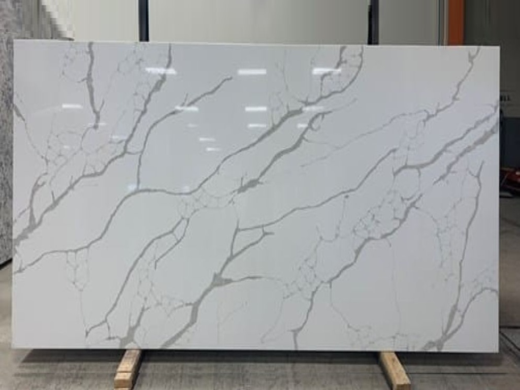 Calacatta Nova Classic Quartz video thumbnail — pristine white base with subtle to pronounced grey veining