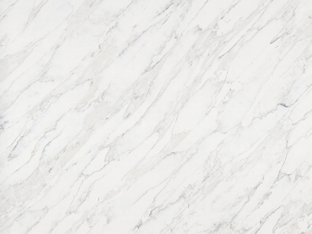 Calacatta Santorini Quartz Noble Stone worktops feature a bright soft white slab with flowing light grey veining and refined marble-inspired movement.